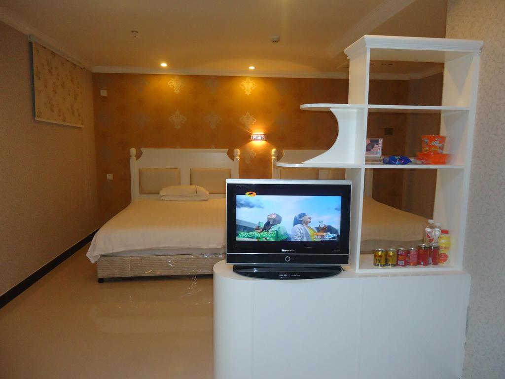 Omeiga Business Hotel Yiwu (Zhejiang) Rom bilde