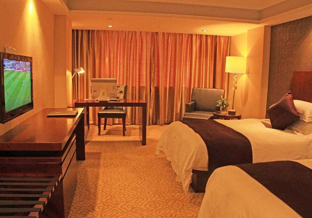 Omeiga Business Hotel Yiwu (Zhejiang) Rom bilde