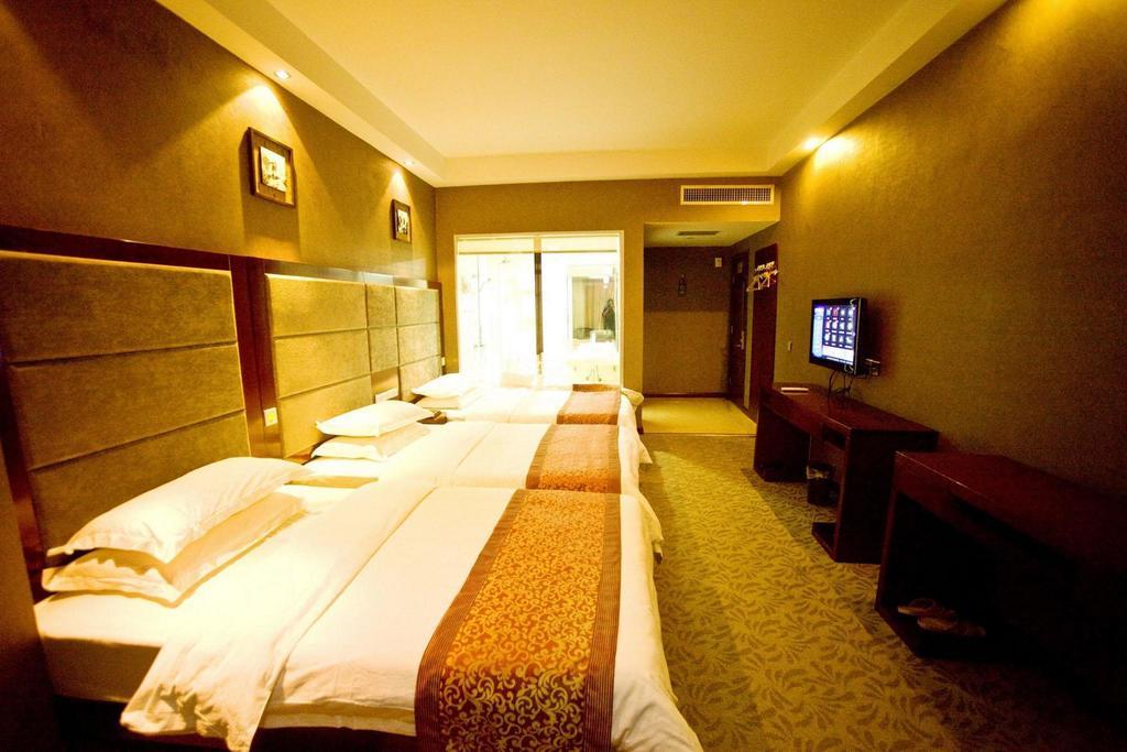 Omeiga Business Hotel Yiwu (Zhejiang) Rom bilde